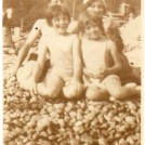Photo:Me and my sister Sylvia with our parents Charles and Eunice on Banjo beach, Brighton, c1936