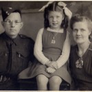 Photo:Mum, Dad and me (10 November 1943).  Dad  - Royal Army Ordnance Corps.