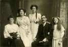 Photo:My grandparents Margaret (nee Buckley) and Albert Woodcock with their children (l-r) Edith, May, and Mary (died 07.03.1934)