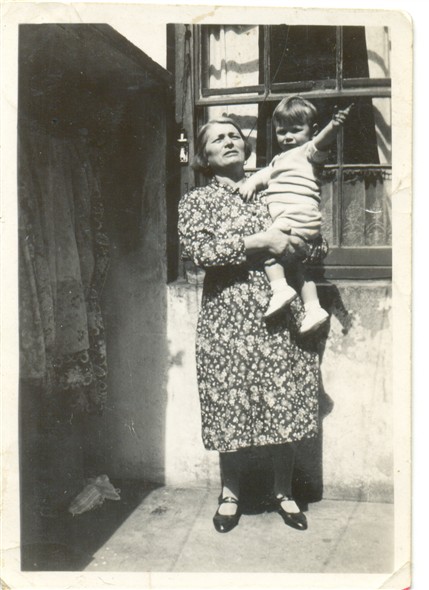 Photo:My paternal grandmother, Teresa, and me in the backyard of 94 Coleman Street. Circa 1940.